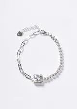 Pulsera de plata 925 con diseño mixto, que combina una mitad de cadena de eslabones alargados y otra mitad de zirconias en línea, con una zirconia cuadrada central de mayor tamaño rodeada de zirconias pequeñas.