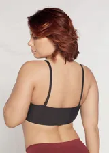 Soutien top color piel de microfibra sin costuras, con breteles regulables y copas removibles.