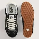 Zapatillas Vans modelo Super Lowpro, de perfil bajo, color negro con detalles en blanco y suela de goma.