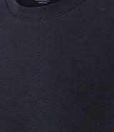 Remera celeste de algodón acanalado, corte slim fit, cuello redondo y mangas cortas.
