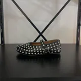 Balerinas negras con apliques de strass.