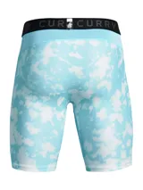 Short deportivo ajustado tipo calza Under Armour de la línea Curry, con diseño estampado en tonos celeste y blanco, cintura elástica ancha negra con marca y logo visible, y pequeño logo en la pierna.