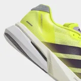 Championes de running Adidas Adizero Boston 13, color amarillo neón con las icónicas tres rayas laterales en color negro. Presenta una mediasuela gruesa con tecnología Lightstrike Pro y suela de alto rendimiento.