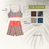 Conjunto deportivo compuesto por un top de breteles finos y un short tipo biker de tiro alto. El top presenta un diseño de rayas verticales multicolores, mientras que el short combina una cintura con estampado floral y piernas con rayas verticales a juego. Confeccionado en lycra reciclada con protección solar.