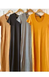 Remerón largo de algodón, disponible en color mostaza, negro, gris y marrón.