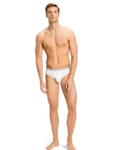 Pack de tres calzoncillos tipo slip de algodón elástico blanco, con cintura elástica con logo Tommy Hilfiger.
