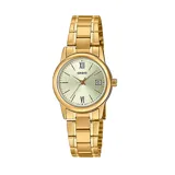 Reloj analógico Casio de mujer con caja y malla de acero inoxidable en tono dorado. Presenta una esfera clara con índices, números romanos en las posiciones 6 y 12, y ventana de fecha.