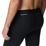 Calza térmica deportiva de hombre Columbia modelo Midweight Stretch, color negro, con diseño ajustado y tecnología Omni-Heat reflectante para retener el calor corporal y Omni-Wick para control de humedad.