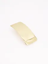 Broche para el pelo de diseño rectangular y curvo, con acabado metálico en tono dorado.