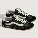 Zapatillas Vans modelo Super Lowpro, de perfil bajo, color negro con detalles en blanco y suela de goma.