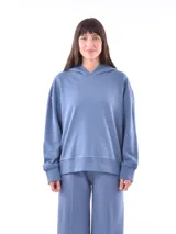 Hoodie azul piedra de corte holgado, con capucha y mangas largas con puños acanalados.