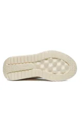 Championes deportivos Fila Calzini de mujer, color beige, con diseño slip-on de tejido elástico tipo media y suela chunky texturizada.