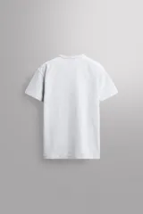 Camiseta de corte relajado confeccionada en tejido de algodón compacto, con cuello redondo y manga corta, perteneciente a la línea Zara Athleticz.