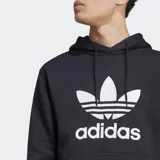 Canguro Adidas negro con capucha y logo Trefoil blanco estampado en el pecho.
