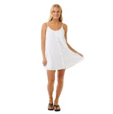 Vestido corto de playa color blanco, confeccionado en gasa de algodón de doble tejido, con tirantes finos y cierre frontal de botones.