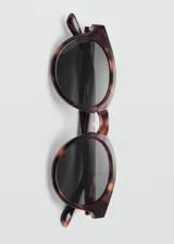Gafas de sol con diseño redondo y montura de pasta con estampado carey. Cuentan con protección UV categoría 3.