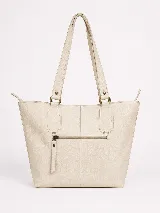 Cartera tote de cuero vacuno negro con acabado de aspecto envejecido. Cuenta con doble asa de hombro, costuras verticales decorativas, detalle de borla colgante con flecos y cierre superior.
