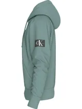 Buzo con capucha Calvin Klein color verde agua, de corte regular, con cordones ajustables, puños y bajo con punto canalé, bolsillo canguro e insignia con el logo de Calvin Klein en la manga.