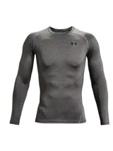 Remera térmica de compresión Under Armour de manga larga, confeccionada en tejido HeatGear ultraligero con paneles de malla estratégicos para ventilación. Presenta diseño ergonómico con mangas raglán y logo de la marca en el pecho.
