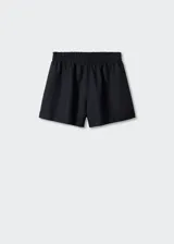 Short de tiro alto confeccionado en mezcla de lino y algodón, con cintura elástica, diseño recto y bajo con vuelta.