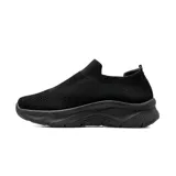 Championes deportivos American Sport modelo Slip On Jazz, color negro. Diseño sin cordones confeccionado en tejido de punto elástico tipo media, con suela alta negra y detalle de logo metálico en el lateral.