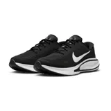 Championes de running Nike modelo Journey Run, color negro con detalles en blanco. Presentan una parte superior de malla transpirable y una entresuela acolchada de gran volumen para mayor amortiguación.