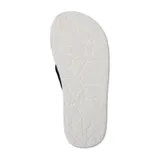 Ojotas Volcom modelo Abg Eco Recliner 2, color negro con detalles en gris y blanco. Confeccionadas con espuma BLOOM a partir de algas, plantilla moldeada con soporte para el arco y parte superior resistente al agua.