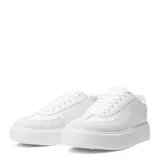 Championes urbanos color beige con plataforma.