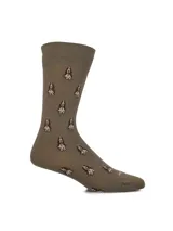 Medias de caña media color taupe, con diseño estampado de perritos Basset Hound en tonos marrones y blancos, de tejido suave y elástico en el puño.
