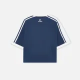 Camiseta azul con mangas blancas y logo de la marca Scuffers estampado en el pecho.