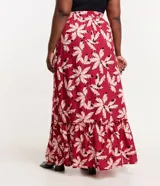 Pollera larga de viscosa con estampado floral, cintura elastizada con lazo y ruedo fruncido. Prenda plus size.