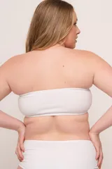 Soutien strapless sin aro, estilo top, color blanco. Confeccionado en algodón elastizado doble y copa moldeada. Tiene bolsillo para colocar copa y armar el busto.