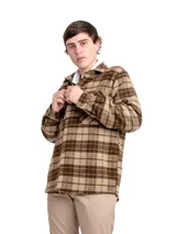 Camisa de manga larga con estampado de tartán en tonos azul marino, rojo y blanco. Confeccionada en 100% lana, con cuello abotonado y puños con botón. Corte clásico.