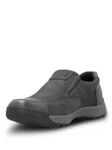 Zapatos slip-on Hush Puppies modelo Consin, color azul marino, confeccionados en cuero con costuras visibles, suela de goma y elásticos laterales para facilitar el calce.