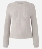 Blusa slim de tejido acanalado con cuello redondo y mangas largas con sisa raglán. Presenta una textura suave y diseño liso.