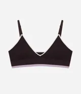 Soutien tipo bralette de diseño seamless en color marrón oscuro, con ribetes en contraste color blanco y banda inferior en color lila. Presenta copas desmontables y breteles finos ajustables.