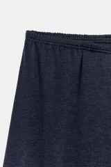 Pantalón ancho azul marino de tiro medio con cintura elástica, confeccionado con hilatura de algodón.
