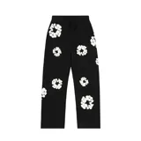 Pantalón de jogging negro con estampado de coronas de algodón blancas.