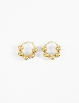 Aros tipo argolla de acero quirúrgico hipoalergénico, color dorado, con cinco bolitas esféricas dispuestas a lo largo del aro.