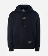 Buzo con capucha de corte boxy, confeccionado en tejido fleece. Presenta una estampa artística en la espalda que ilustra a un jugador de fútbol y firma bordada en el pecho.