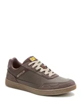 Zapatillas Caterpillar modelo Pause Retro Leather, de color marrón, con diseño minimalista de inspiración retro, confeccionadas en cuero y ante con suela de goma texturizada.