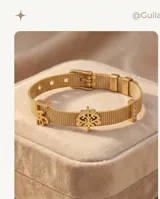Pulsera de acero italiano con baño de oro, diseño de malla metálica con dijes colgantes del Árbol de la Vida y la palabra 'life', decorada con barras de circonias.