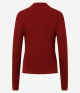 Blusa de manga larga con textura acanalada, cuello polo y escote en V. Confeccionada en tejido de viscosa y poliamida, presenta un corte regular que se ajusta de forma anatómica al cuerpo.