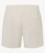 Bermuda runner de terciopelo color gris topo, con cintura elástica, cordón ajustable y bolsillos laterales.