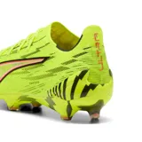 Championes de fútbol Puma Ultra 6 Ultimate FG, color amarillo flúor con detalles en negro y naranja.