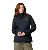 Campera acolchada de mujer con tecnología térmica, cierre frontal completo, cuello alto y puños con orificios para pulgares. Presenta un diseño de costuras horizontales y diagonales, con logo de la marca en el pecho.