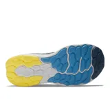 Championes de running New Balance modelo 1080 V12 para hombre, color azul con detalles en amarillo. Confeccionados con tecnología Hypoknit y entresuela Fresh Foam X.