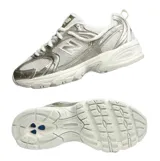 Championes New Balance modelo 530, con diseño retro inspirado en el running. Presenta una estructura de malla transpirable con revestimientos sintéticos en tono dorado metálico. Cuenta con entresuela con tecnología ABZORB para una amortiguación superior y suela de goma resistente.