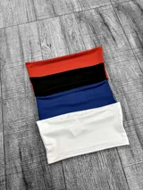 Top bandeau de microfibra sin tirantes, en color blanco, azul, negro y rojo.