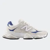 Championes New Balance modelo 9060, con diseño inspirado en la estética Y2K. Presenta una combinación de colores crema, blanco y azul, con entresuela esculpida de doble densidad y amortiguación ABZORB y SBS.